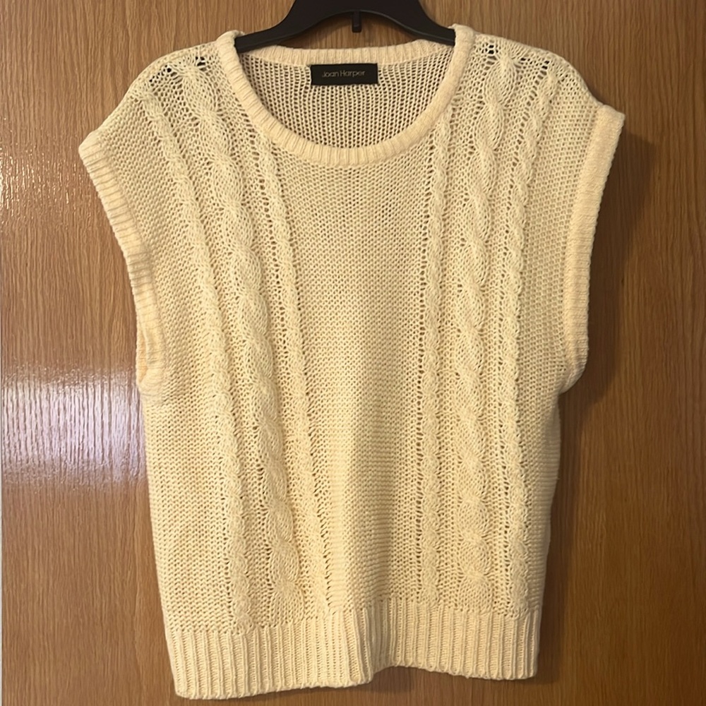 Yellow sweater vest